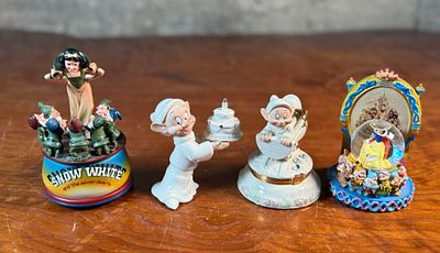 LENOX FOR DISNEY, SNOW GLOBE, & MUSICAL FIGURINE. This lot features a collection of Disney items 