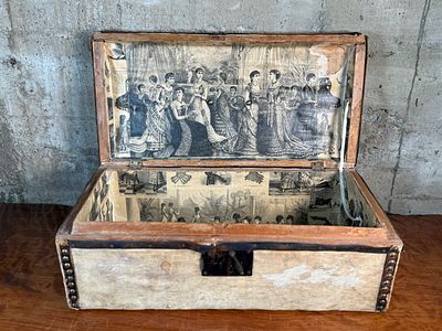 19TH CENTURY IMMIGRANT TRUNK. This lot features an antique trunk, most likely an immigrant trunk 