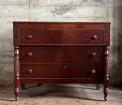 AMERICAN EMPIRE MAHOGANY CHEST OF DRAWERS. This lot features a 19th century American Empire 