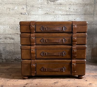 LEXINGTON LEATHER, SUITCASE STACKED LUGGAGE CHEST DRESSER. This lot features a Lexington leather 