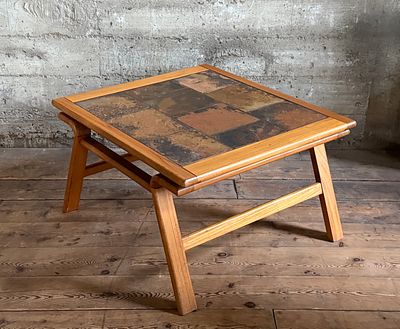 DANISH MODERN COFFEE TABLE WITH CERAMIC TILE TOP. This lot features a Danish modern coffee table 