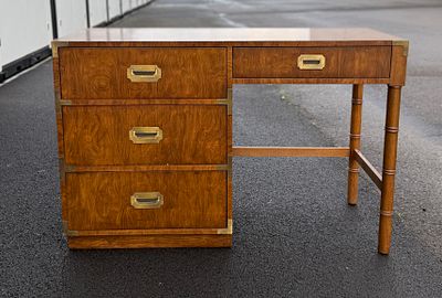 DIXIE CAMPAIGN DESK. This lot features a campaign style desk, manufactured by Dixie. Maker stamp 