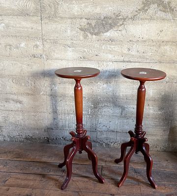 PAIR OF SOLID MAHOGANY PLANT STANDS. This lot features a pair of vintage solid mahogany plant 