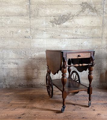 PENNSYLVANIA HOUSE CHERRY WOOD DROP LEAF ROLLING TEA CART. This lot features a vintage 