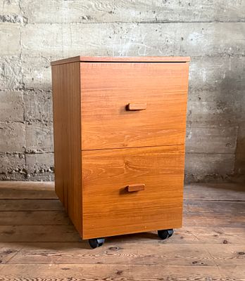 LAURITS M. LARSEN FOR MOBELFABRIK, TEAK FILE CABINET. This lot features a vintage mid-century 