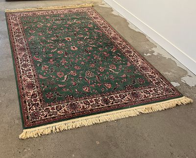 GREEN KESHAN KARASTAN RUG. This lot features a green Keshan Karastan rug that measures, 102'' H 