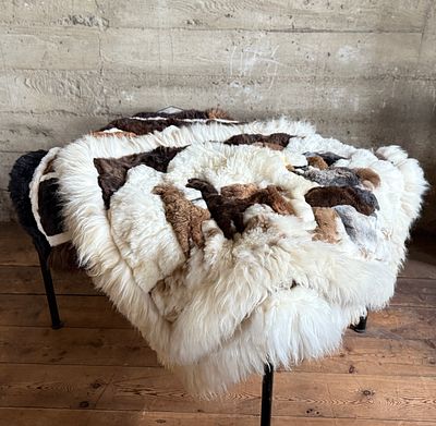 THREE PERUVIAN ALPACA FUR WORKS OF ART. This lot features three (3) Peruvian Alpaca fur works of 