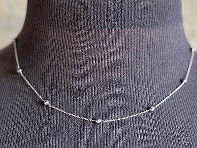 14K GOLD & PEARL NECKLACE. This lot features a 14k gold necklace with genuine pearls. The 