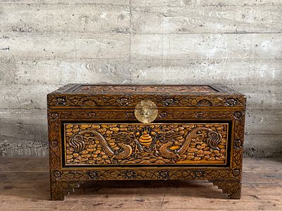 CHINESE HAND-CARVED CAMPHOR WOOD CHEST. This lot features a Chinese hand-carved camphor wood 