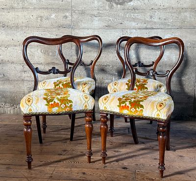VICTORIAN BALLOON-BACK DINING CHAIRS. This lot features a set of four (4) rosewood Victorian 