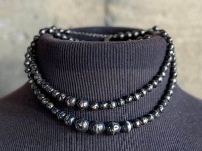 STERLING SILVER BEADED NECKLACE. This lot features a vintage sterling silver beaded necklace 