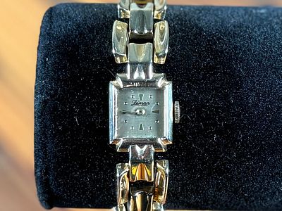 14K GOLD LEMAN WATCH. This lot features a 14k gold Leman watch with a total approx. weight of 