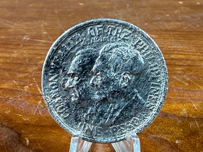 1936 PHILIPPINES PESO, .900 SILVER. This lot features a rare 1936 Philippines peso with only 10 