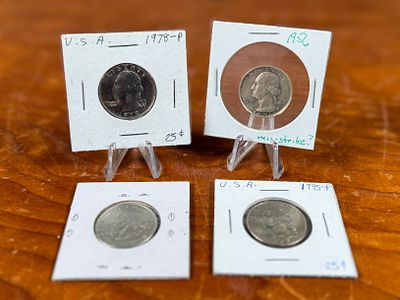 SILVER QUARTER COLLECTION. This lot features a collection of four (4) silver quarters from 