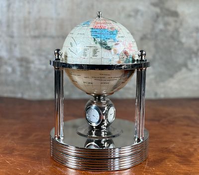 MOTHER OF PEARL & GEMSTONE ROTATING GLOBE. This lot features a mother of pearl and gemstone 