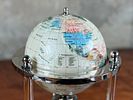 MOTHER OF PEARL & GEMSTONE ROTATING GLOBE. This lot features a mother of pearl and gemstone Image - 1