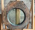 NAUTICAL PORTHOLE WINDOW. This lot features an authentic salvaged nautical porthole window that Image - 7