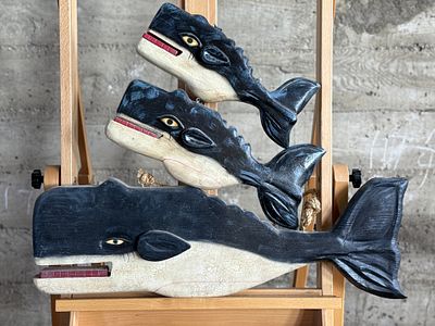 FOLK ART, WHALE SCULPTURES. This lot features a set of three (3) folk art whale sculptures with 