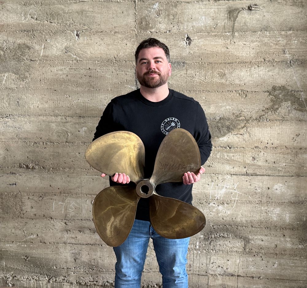 SOLID BRASS SHIP PROPELLER. This lot features a stunning solid brass ship propeller with a total 