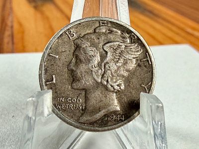 1944 WEST POINT MERCURY DIME WITH ERRORS. This lot features a 1944 West Point Mercury dime with 