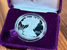 1986 AMERICAN SILVER EAGLE PROOF COIN, .999 FINE SILVER. This lot features a 1986 American Image - 1