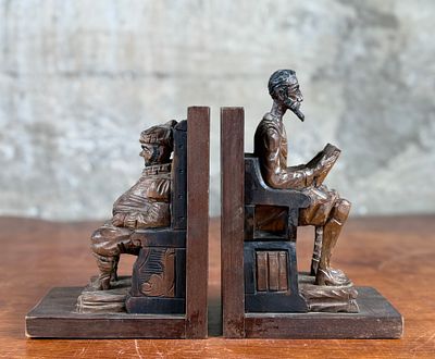 DON QUIXOTE SPANISH FOLK ART BOOKENDS. This lot features a vintage pair of wooden Don Quixote 