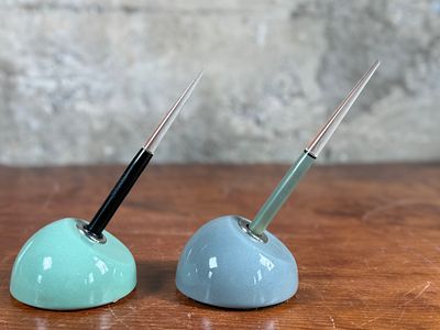 ESTERBROOK DIP PENS WITH CERAMIC HOLDERS. Esterbrook dip pens featuring metal nibs marked 