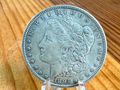 1891-S MORGAN DOLLAR. This lot features a 1891-S Morgan Dollar.