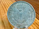 1884-O MORGAN DOLLAR. This lot features a 1884-O Morgan Dollar.Image - 1