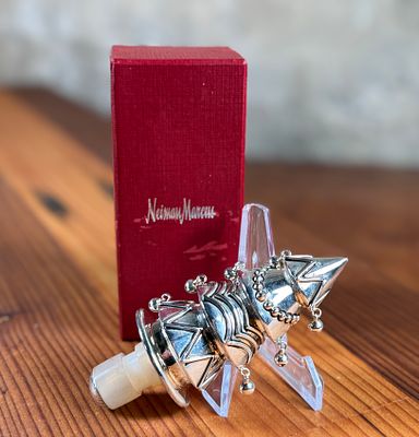 NEIMAN MARCUS SILVER-TONED WINE STOPPER WITH BOX. Silver-toned wine stopper adorned with 
