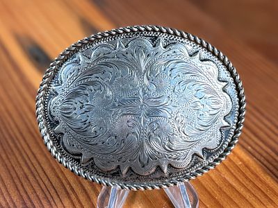 STERLING SILVER KUSTOM KRAFT BELT BUCKLE WITH ENGRAVED DESIGN. Sterling silver belt buckle 