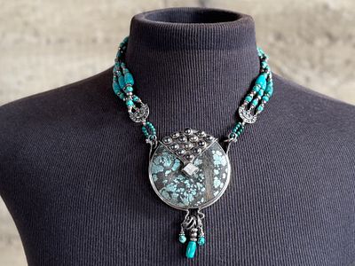 STERLING SILVER TURQUOISE MULTI-STRAND NECKLACE. Multi-strand necklace with turquoise and silver 