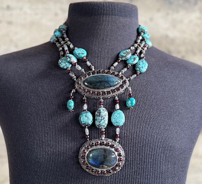 STERLING SILVER MULTI-GEMSTONE STATEMENT NECKLACE. Sterling silver statement necklace featuring 