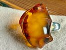 MONUMENTAL STERLING SILVER & AMBER RING. Sterling silver ring featuring a large, polished amber Image - 3
