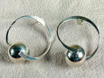 STERLING SILVER MODERNIST KINETIC EARRINGS. Sterling silver earrings designed in a modernist 