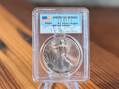 2004 AMERICAN SILVER EAGLE PCGS MS69. 2004 American Silver Eagle graded MS69 by PCGS, part of 