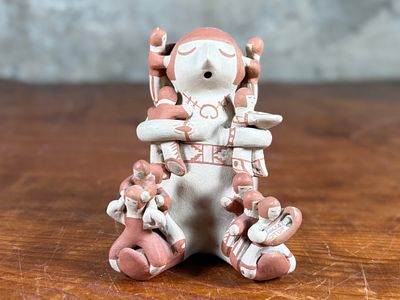 LUPE LUCERO LORETTO, SCULPTURE. This lot features an original sculpture by listed Pueblo artist 