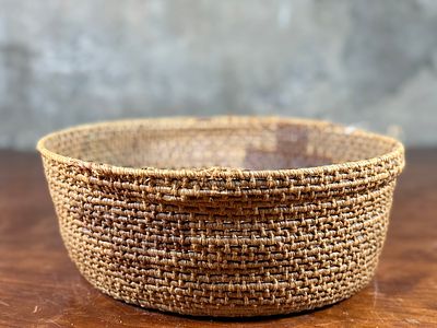 PAPAGO SQUASH BLOSSOM BASKET, EARLY 20TH CENTURY. This lot features a Papago squash blossom 
