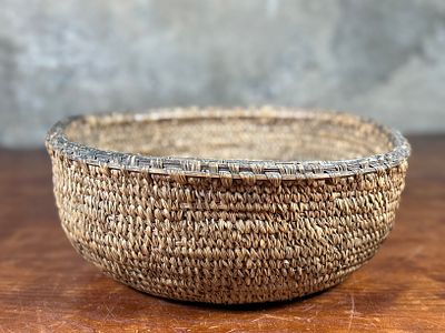 CASCADES PLATEAU, CEDAR ROOT BASKET. This lot features a turn of the century basket made of 