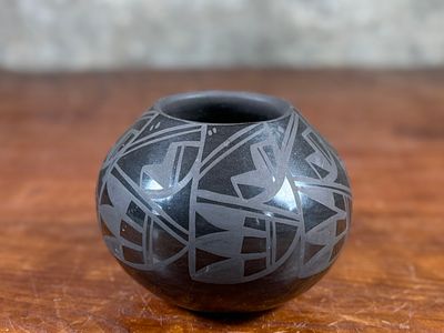 BIRDELL BOURDON, PUEBLO POTTERY. This lot features a beautiful vase by listed artist, Birdell 