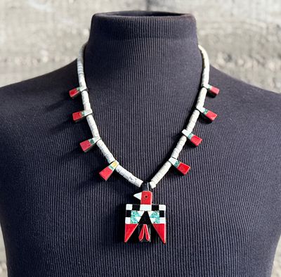 SANTO DOMINGO PUEBLO (KEWA) THUNDERBIRD NECKLACE. This lot features an antique Santo Domingo 