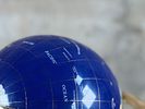 BLUE LAPIS GEMSTONE GLOBE #1. This lot features a vintage blue lapis gemstone globe with a gold Image - 4