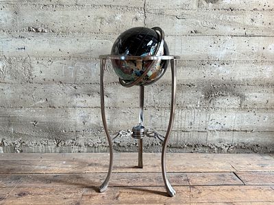 GEMSTONE GLOBE WITH BLACK ONYX OCEAN ON STAND. This lot features a vintage gemstone globe with a 