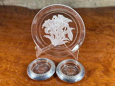 HOYA, CRYSTAL GLASS PLATE & PAIR OF SILVER WINE COASTERS. This lot features a signed Hoya 