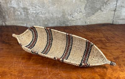HANDWOVEN ETHIOPIAN GAMBELA BREAD BASKET. This is a handwoven Ethiopian Gambela canoe-shaped 