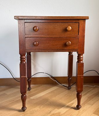 SHERATON-STYLE TWO DRAWER STAND. This lot features a 19th century Sheraton-style two drawer 