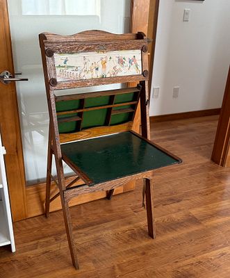 CHILD'S FOLDING EASEL CHALKBOARD. This lot features an antique child's folding easel chalkboard 