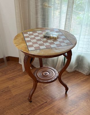 ANTIQUE GAME TABLE WITH POLISHED MARBLE TOP. This lot features a stunning antique game table on 