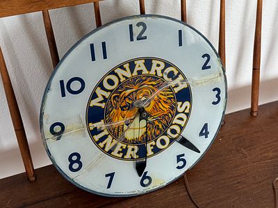 MONARCH FINER FOODS, ADVERTISING CLOCK. This lot features an advertising clock for Monarch Finer 