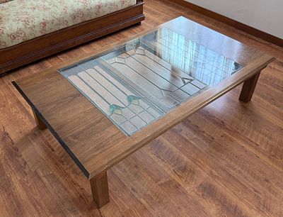 ART NOUVEAU STAINED GLASS PANELS SET INTO COFFEE TABLE. This table features antique American Art 